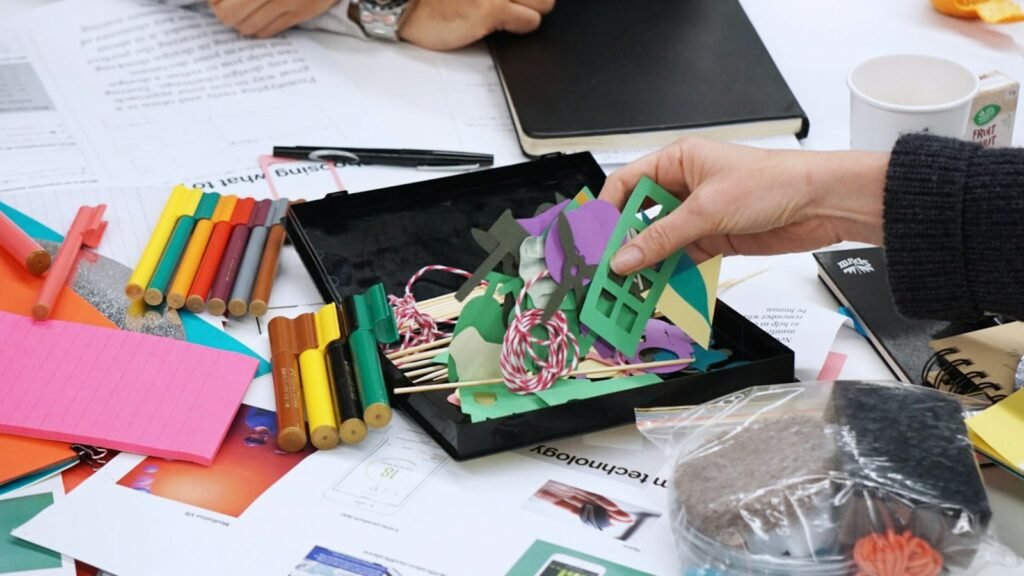 Hands-on creative workshop materials on a table